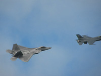 F-22 chasing F-16 . . .